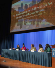 Panel of five speakers on stage at the Rosalynn Carter Fellowships for Mental Health Journalism Annual Meeting 2023