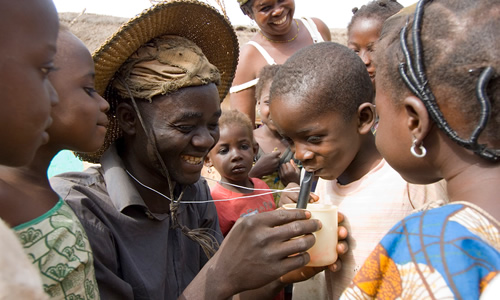 Woman giving water