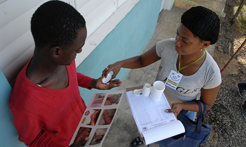 Woman giving medicine